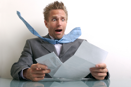 Man looking at bills